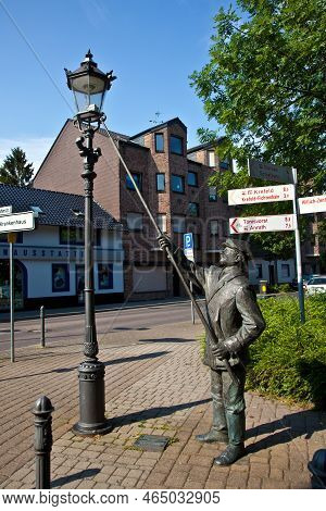 Willich, Germany - June 3, 2011: Statue For The Historic Figure Of The Lateerepit, The Man Who Light