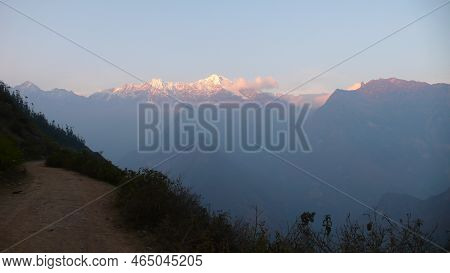 Amdes Sky And Mountains With Sun Beams