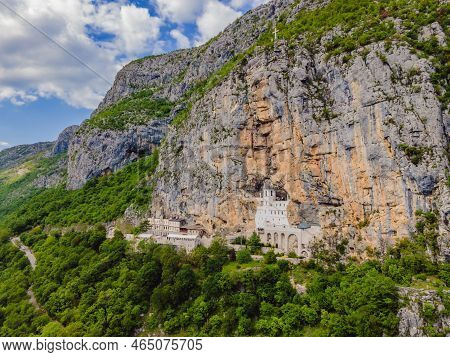 Monastery Of Ostrog, Serbian Orthodox Church Situated Against A Vertical Background, High Up In The 