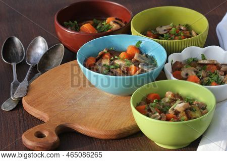 Meat Stew With Vegetable In Bowl On Rustic Wooden Background