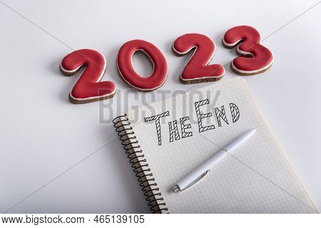 Number 2023, Pen And Notebook With The End Inscription Close Up. White Background