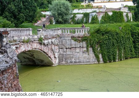 Sharovka, Ukraine - July 24, 2021: These Are The Ruins Of The Terraces Of The Park With A Pond Of Th