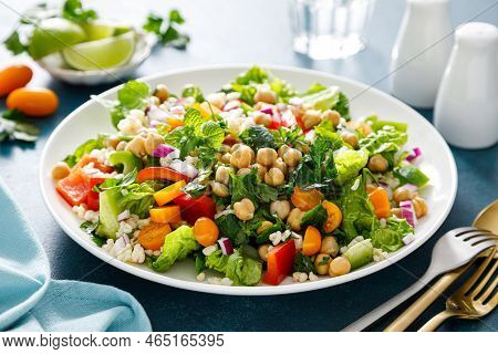 Tabbouleh Salad. Tabouli Salad With Fresh Parsley, Onions, Tomatoes, Bulgur And Chickpea. Healthy Ve