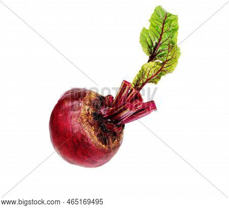Beetroot On White . One Fresh Red Beet With Leaves Isolated On White Background