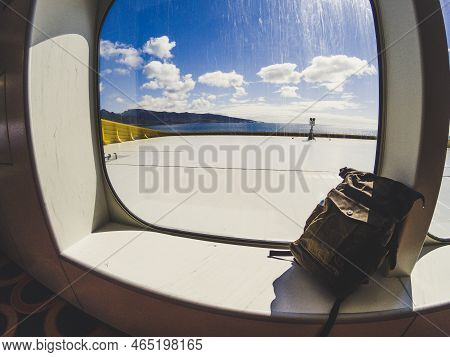 Leather Trendy Backpack Near A Windoe On Ferry Boat For Traverl Holiday Summer Vacation Concept For 