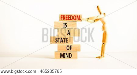 Freedom In Mind Symbol. Concept Words Freedom Is A State Of Mind On Wooden Blocks On A Beautiful Whi