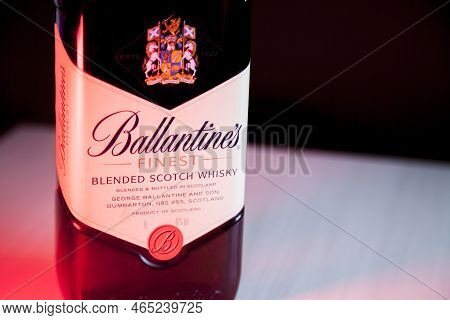 Ballantines Whiskey Bottle With Colorful Lights Background In Bar. Ballantines Concept. Whiskey Conc
