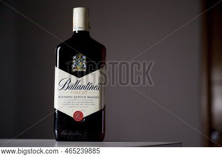 Ballantines Whiskey Bottle With Colorful Lights Background In Bar. Ballantines Concept. Whiskey Conc