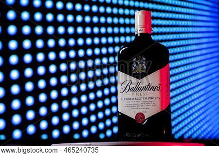 Ballantines Whiskey Bottle With Colorful Lights Background In Bar. Ballantines Concept. Whiskey Conc