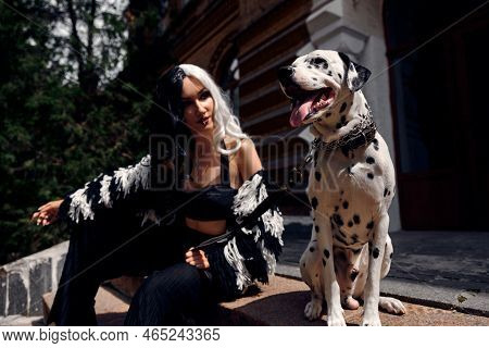 Cosplay On Cruella De Vil With A Dalmatian