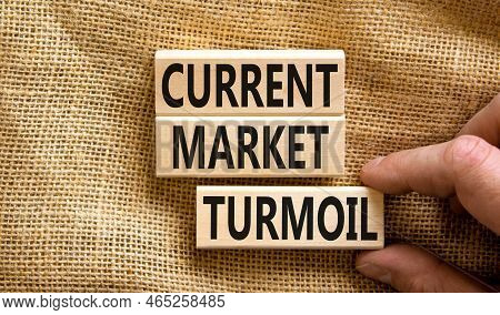 Current Market Turmoil Symbol. Concept Words Current Market Turmoil On Wooden Blocks On A Beautiful 