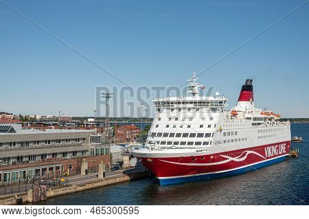Helsinki, Finland - July 20, 2022: Historic Port. Docked White-red Viking Line Ferry Boat Near Scand