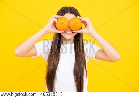 Funny Teenager Portrait. Happy Teenager Girl Hold Grapefruit Orangeisolated On Yellow Background, Ki