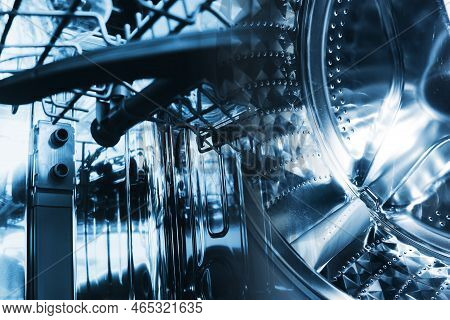 Washing Machine Background. Inside The Washing Machine. Metal Washing Machine Drum. Inside Empty Dis