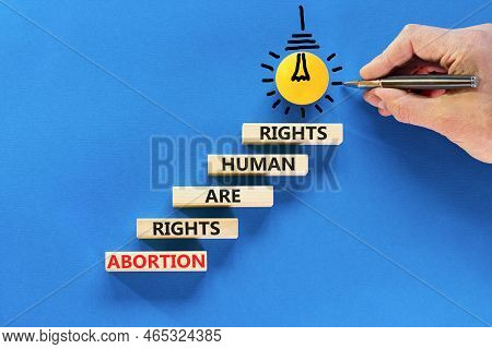 Abortion Rights Symbol. Concept Words Abortion Rights Are Human Rights On Wooden Blocks. Businessman