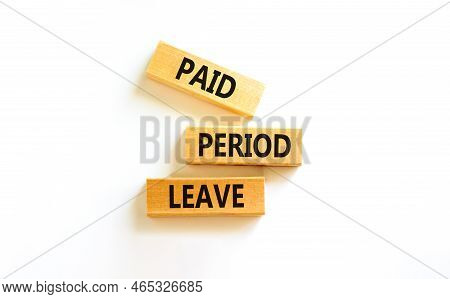 Paid Period Leave Symbol. Concept Words Paid Period Leave On Wooden Blocks. Beautiful White Table Wh