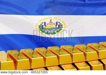 Row Of Shining Golden Bullions On The El Salvador Flag Background. Business And Financial Countrys R