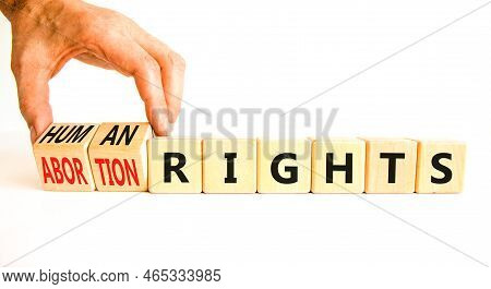 Abortion Rights Symbol. Concept Words Abortion Rights Are Human Rights On Wooden Cubes. Businessman 