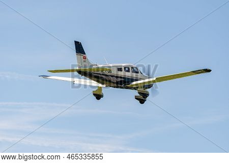 Lommis, Switzerland, May 11, 2022 Piper Pa28-181 Archer Iii Propeller Plane Is Departing From A Smal