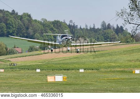 Lommis, Switzerland, May 11, 2022 Diamond Da40d Propeller Plane Is Taxiing On The Grass On A Small A