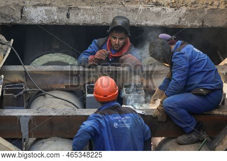 Bucharest, Romania - November 10, 2022: Workers On A Construction Site Repair A Radet (termoenergeti