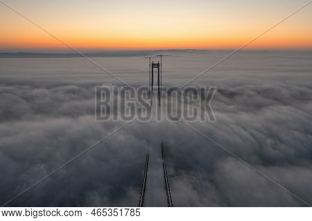 Panoramic Aerial Drone View From Above Of The Suspended Bridge Over Danube River, Under Construction