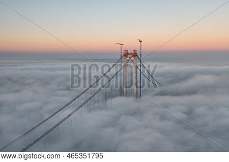 Panoramic Aerial Drone View From Above Of The Suspended Bridge Over Danube River, Under Construction