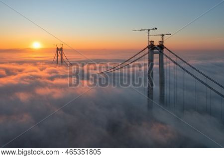 Panoramic Aerial Drone View From Above Of The Suspended Bridge Over Danube River, Under Construction