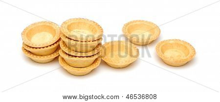 empty tartlets isolated on white