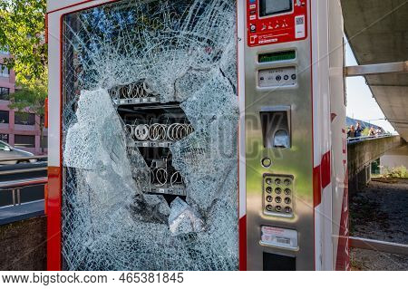 Lausanne, Vaud, Switzerland - 21 September, 2022: Damaged Selecta Vending Machine. Broken Glass. Vio