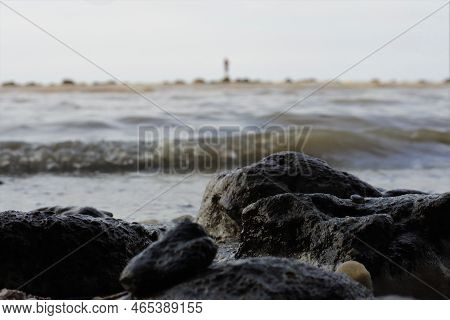 Shot Of Waves On The Kartini Beach, Rembang, Central Java, Indonesia. Sea Stock. Looks Like A Fisher