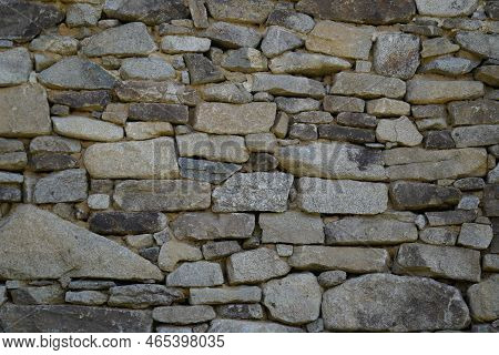 Farmhouse With Lots Of Wood And Stone In Detail