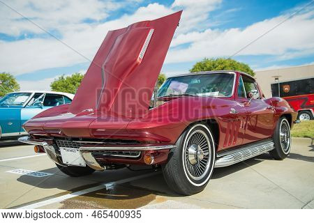 Westlake, Texas - October 15, 2022: Front Side View Of A Red 1966 Chevrolet Corvette 427 Classic Car