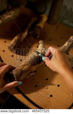 Female Using Power Wood Working Tools Graver, Carving While Crafting