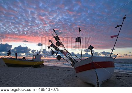 Fishing Boat On The Beach Of The Polish Baltic Coast Near Rewal. Sunset