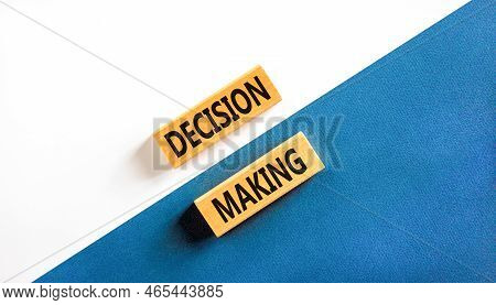Decision Making Symbol. Concept Words Decision Making On Wooden Blocks. Beautiful White And Blue Bac