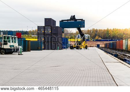 Forklift Handling Cargo Container. Freight Container Loading. Container Handler.  Logistics Import E