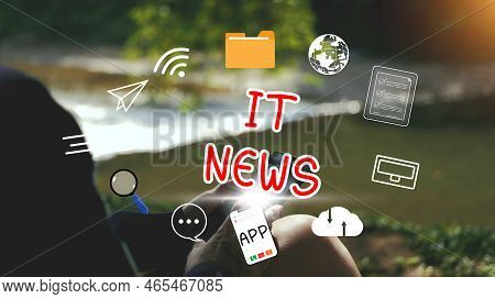 It News Concept. Hand Holding Smartphone Using To Watch Around The Globe News And Daily Updates On W