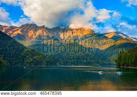 Lake Ritsa Panoramic View At Sunset. Lake Ritsa Is A Lake In The Caucasus Mountains In Abkhazia Regi