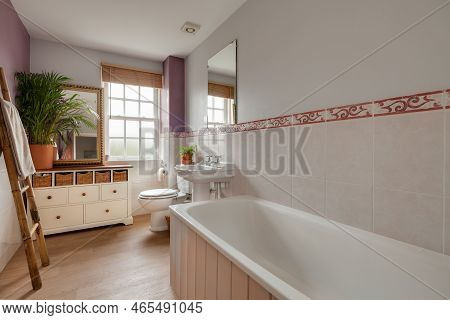 Fen Ditton, England - Jan 10 2019: Luxury House Bathroom With Toilet And Stylish Cabinet