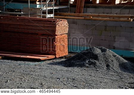 In The Yard We Work With Wooden Prisms And Planks To Repair The Roof. Saw, Cutter, Formats Them To T