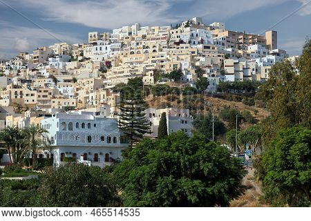 Picturesque Spanish Hillside White-washed Village Of Mojacar During Sunny Day Against Blue Sky. Trav