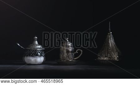 Silver Coffee Cup And Sugar Jars With Dates.