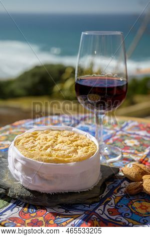 Tasting Of Tawny Porto Wine And Local Portuguese Matured Cheese Queijo Serpa With View On Blue Atlan