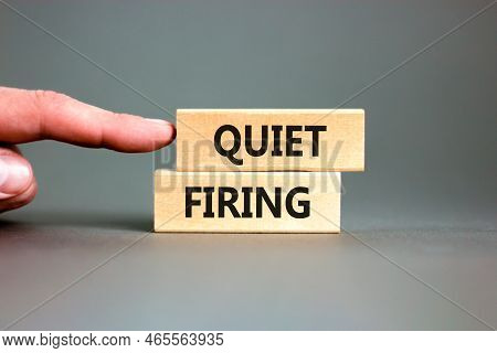 Quiet Firing Symbol. Concept Words Quiet Firing On Wooden Blocks. Beautiful Grey Table Grey Backgrou