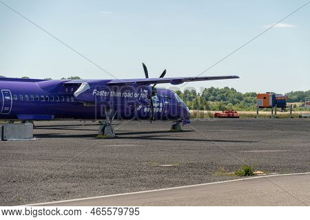Saarbruecken, Germany, July 10, 2022 Bombardier Dhc-8-402q Dash 8 Propeller Aircraft At The Parking 