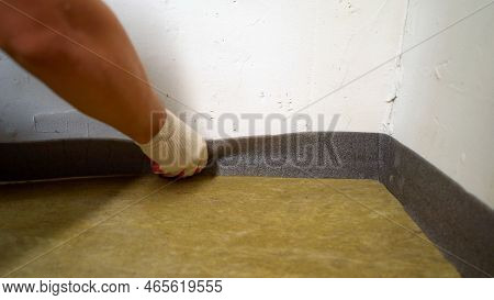 Sticking Damper Tape For Pouring The Floor. Gluing Tape For Further Pouring The Floor. Damper Tape F