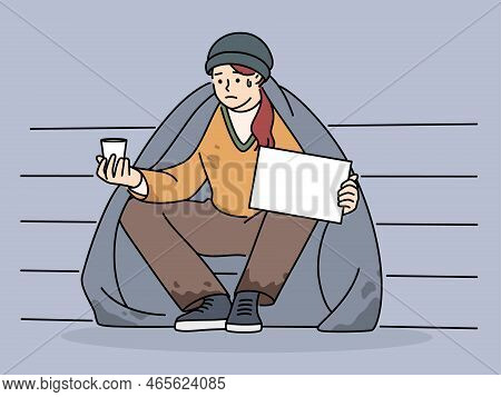 Poor Man Sit On Street With Mockup Placard Ask For Money. Unhappy Male Beggar Suffer From Poverty. V