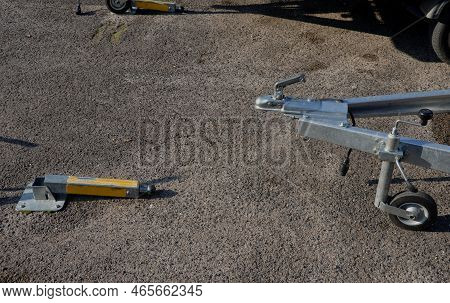 Lockable Parking Lot For Trailers Behind A Car Or Pickup Truck. The End Of The Towing Device On The 