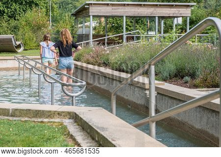 Grafenau, Bavaria, Germany, August 04, 2018: Two Young Girls Taking A Kneipp Cure In Summer At The S